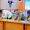 H. Amirudin Tamoreka, mengahadiri penandatanganan komitmen bersama tentang pembangunan meritokrasi